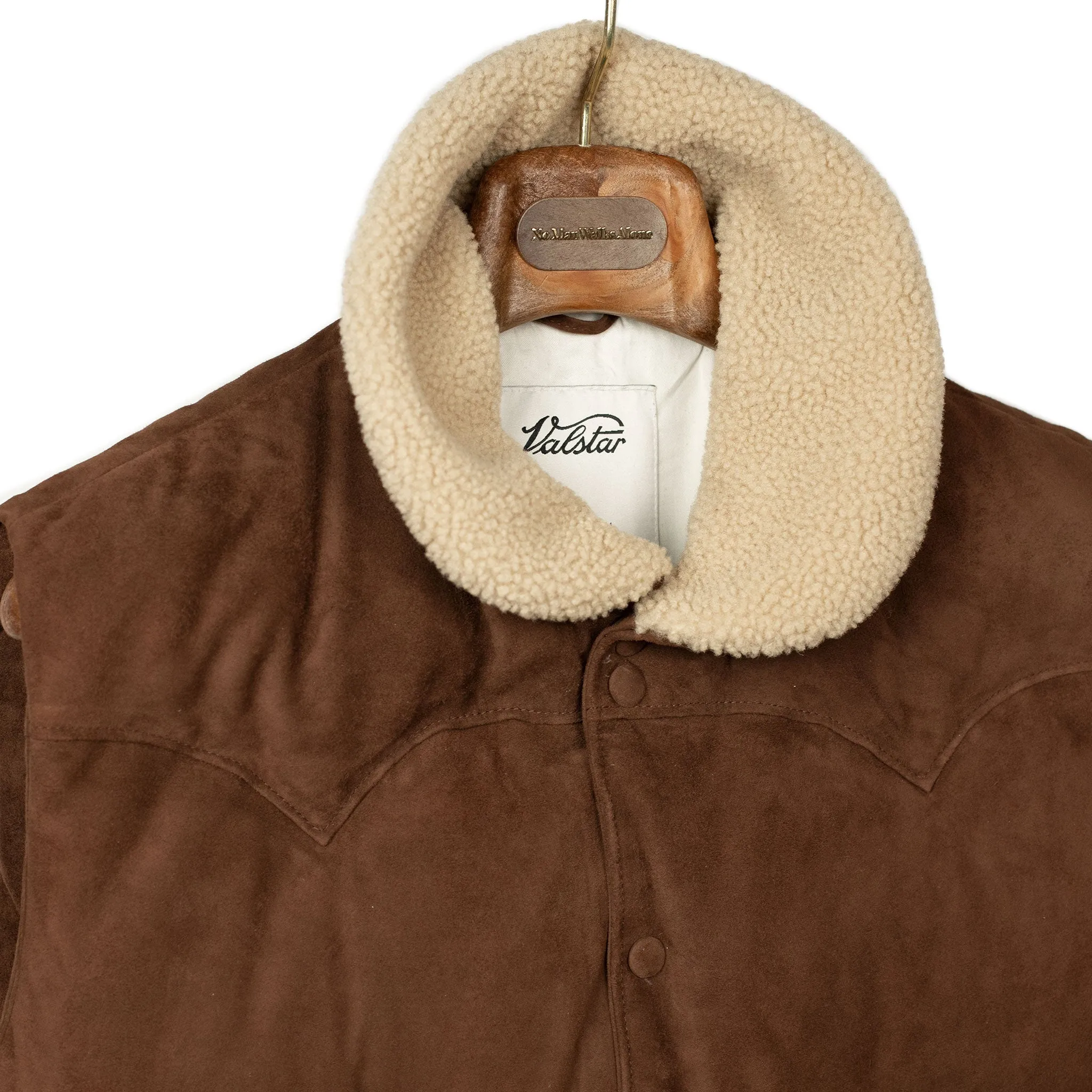 Down-filled vest in brown suede