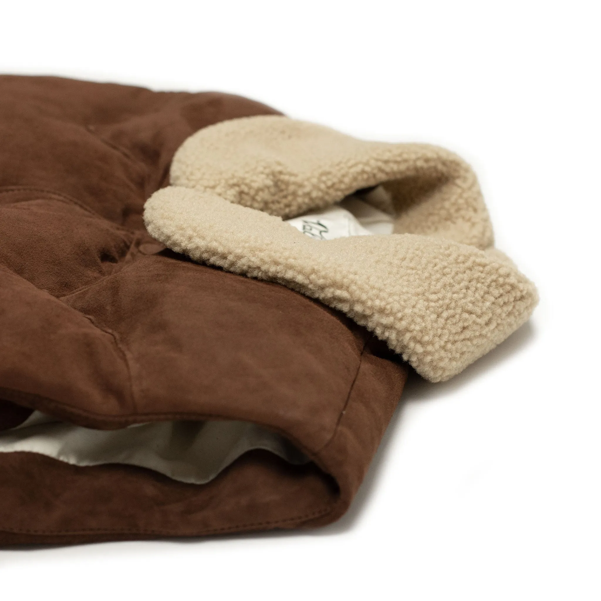 Down-filled vest in brown suede