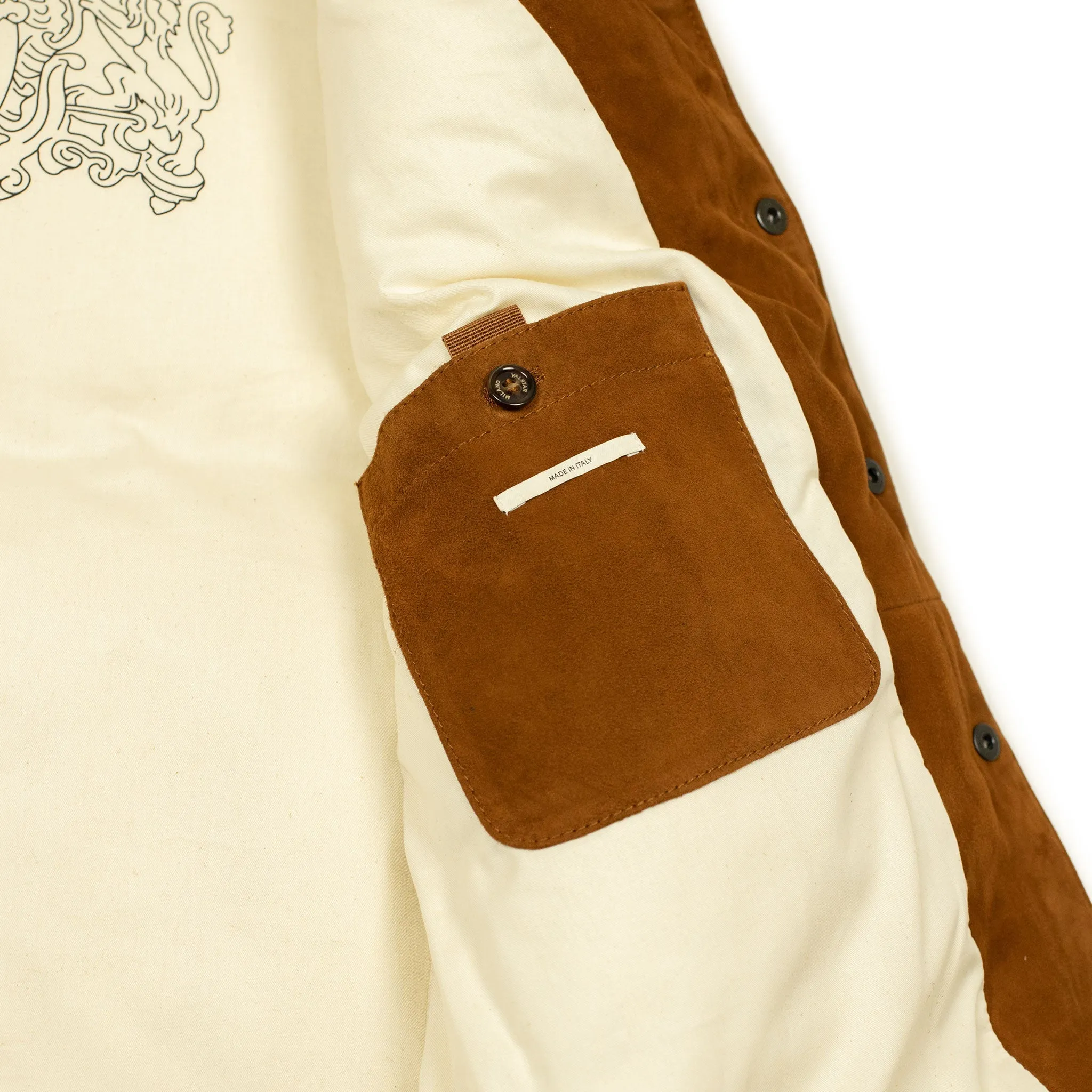 Down-filled vest in tan suede