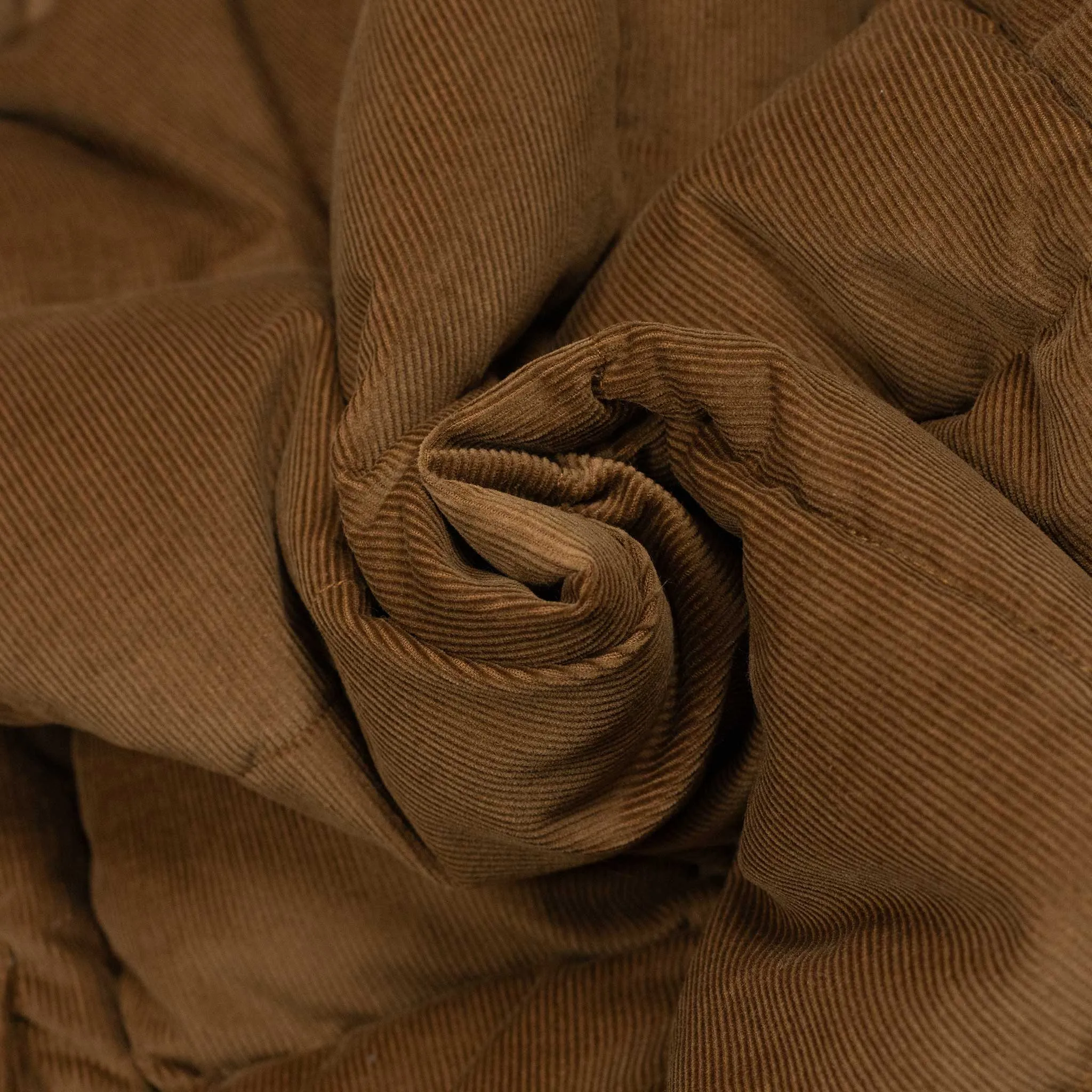 Oliver down-filled vest in sandal brown corduroy